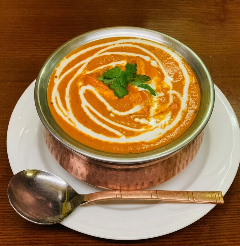Creamy tomato-based Butter Chicken curry at Sagarmatha Curry Palace, Hamilton, ON