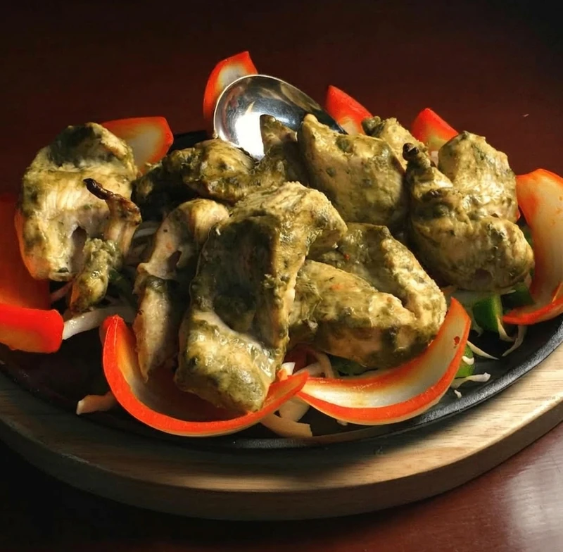 Green herb-marinated Chicken Haryali Tikka at Sagarmatha Curry Palace, Hamilton, ON