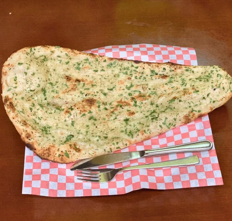 Garlic Naan at Sagarmatha Curry Palace, Indian and Nepalese restaurant in Hamilton, ON